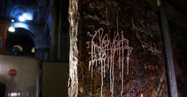 A stone slab said to be the decorated frontal of the Crusader-era high altar of the Church of the Holy Sepulchre according to researchers at the Israel Antiquities Authority and Austrian Academy of Sciences is seen in the Church of the Holy Sepulchre after it was recently turned over during renovations and its significance rediscovered, Jerusalem&#039;s Old City, Israel, April 11, 2022. (Reuters Photo)