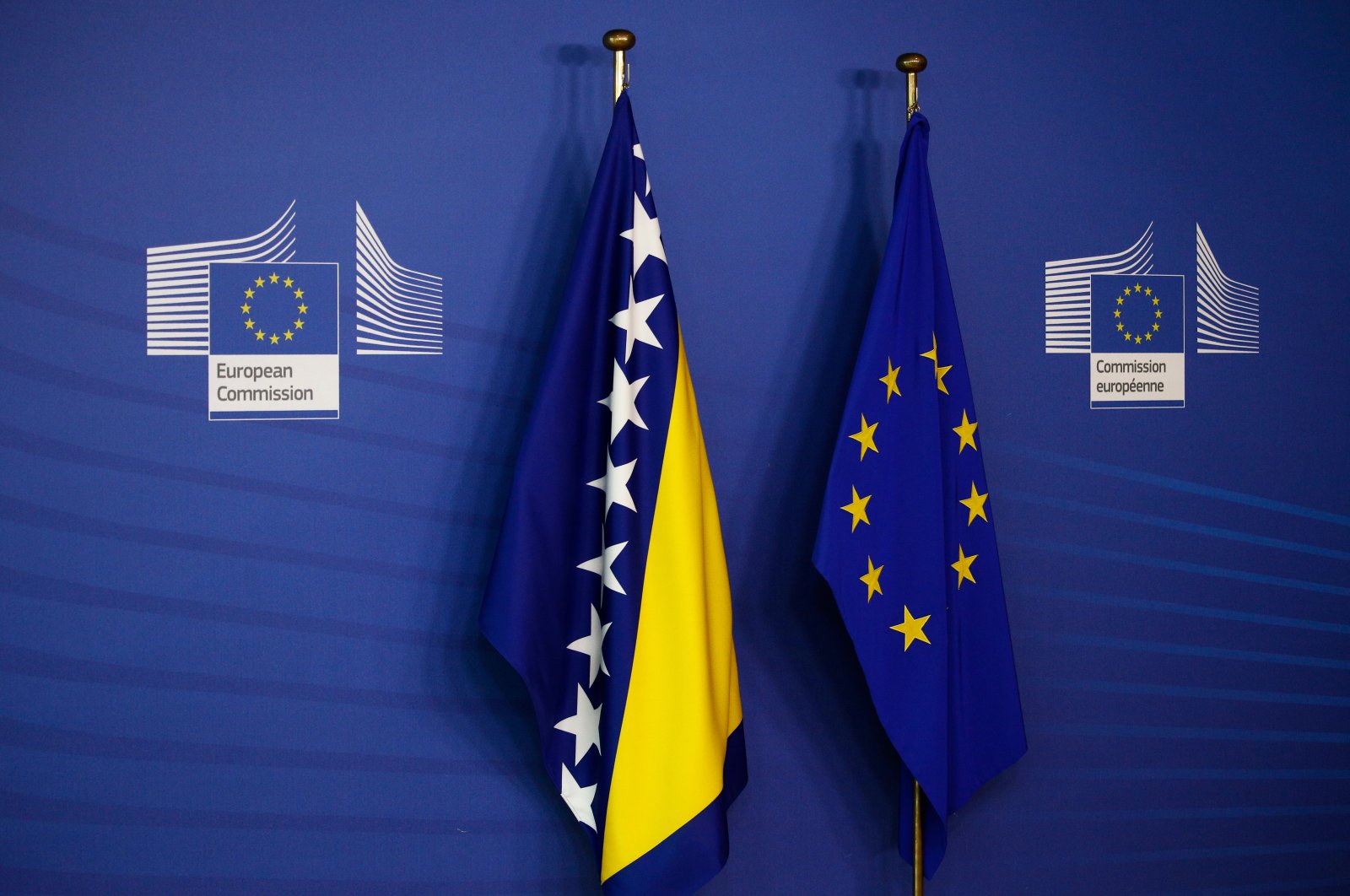 The flags of the European Union and Bosnia-Herzegovina are seen outside of the European Commission, Brussels, Belgium, March 4, 2019. (Shutterstock Photo)