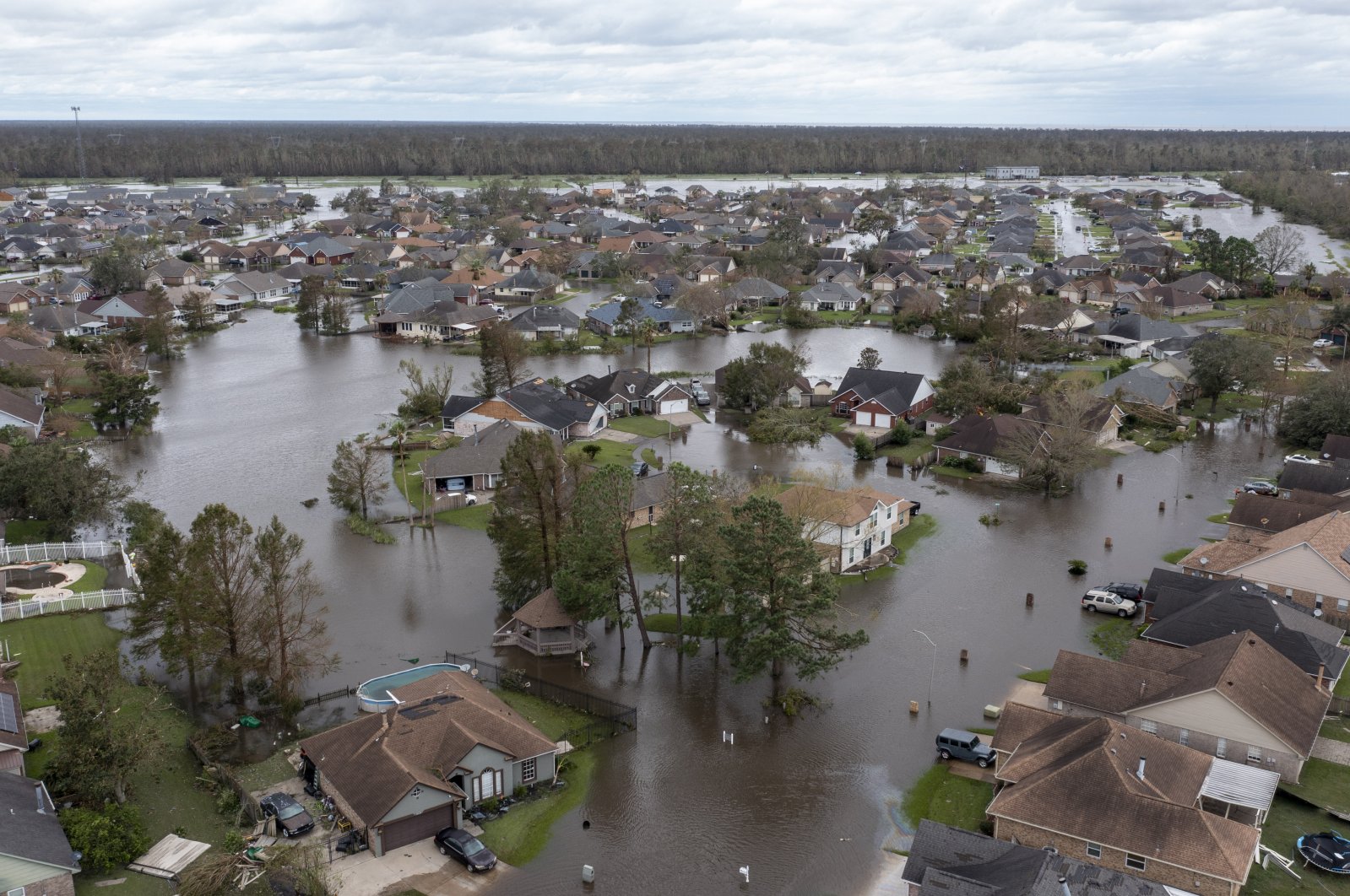 Flooded streets and homes can be seen after Hurricane Ida moved through in the Spring Meadow subdivision in LaPlace, Louisiana, U.S., Aug. 30, 2021. (AP Photo)