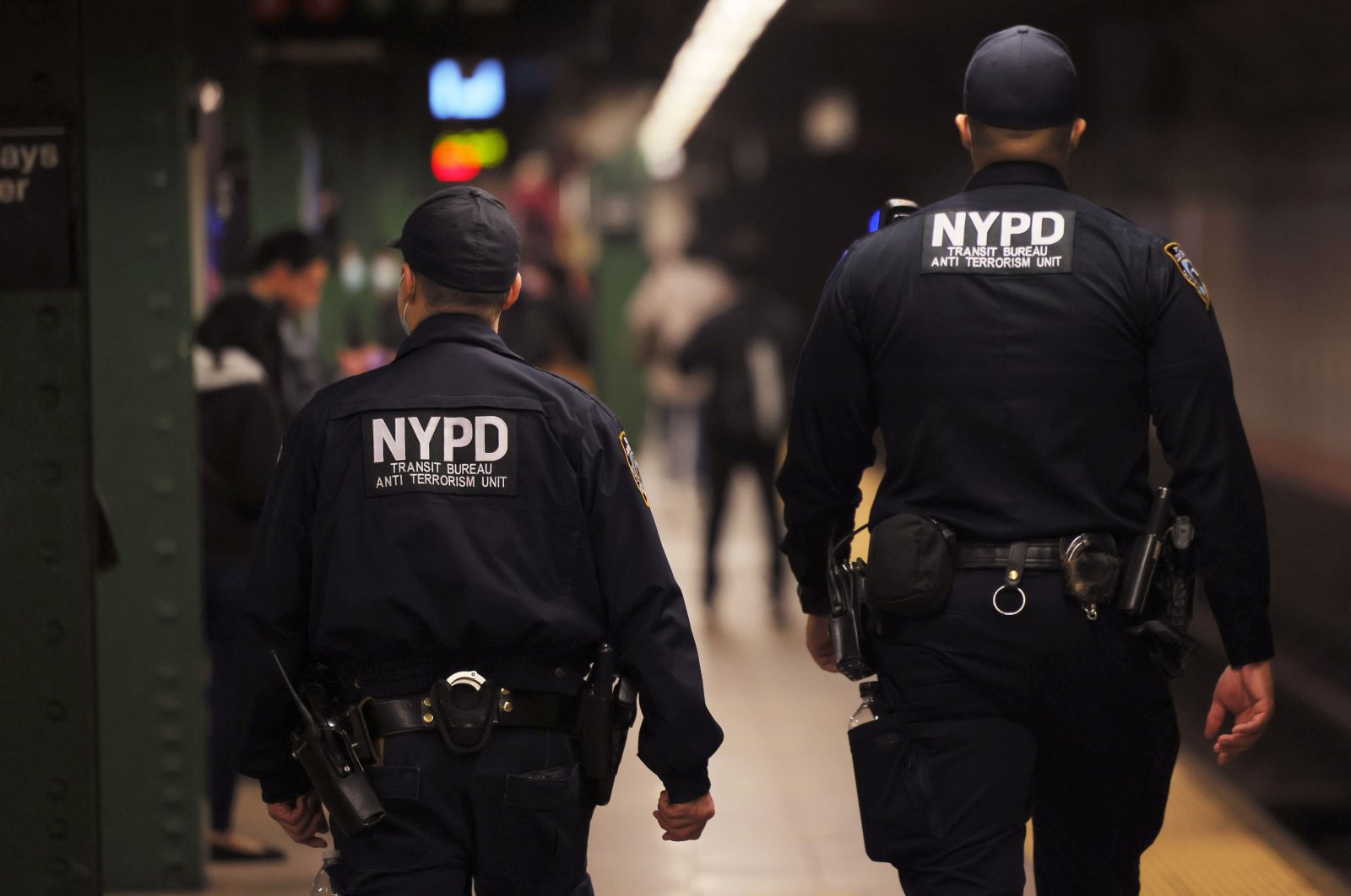 NYPD officers patrol the subway platform at the Atlantic Avenue subway station in the Sunset Park neighborhood of Brooklyn in New York City, April 13, 2022. (AFP Photo)