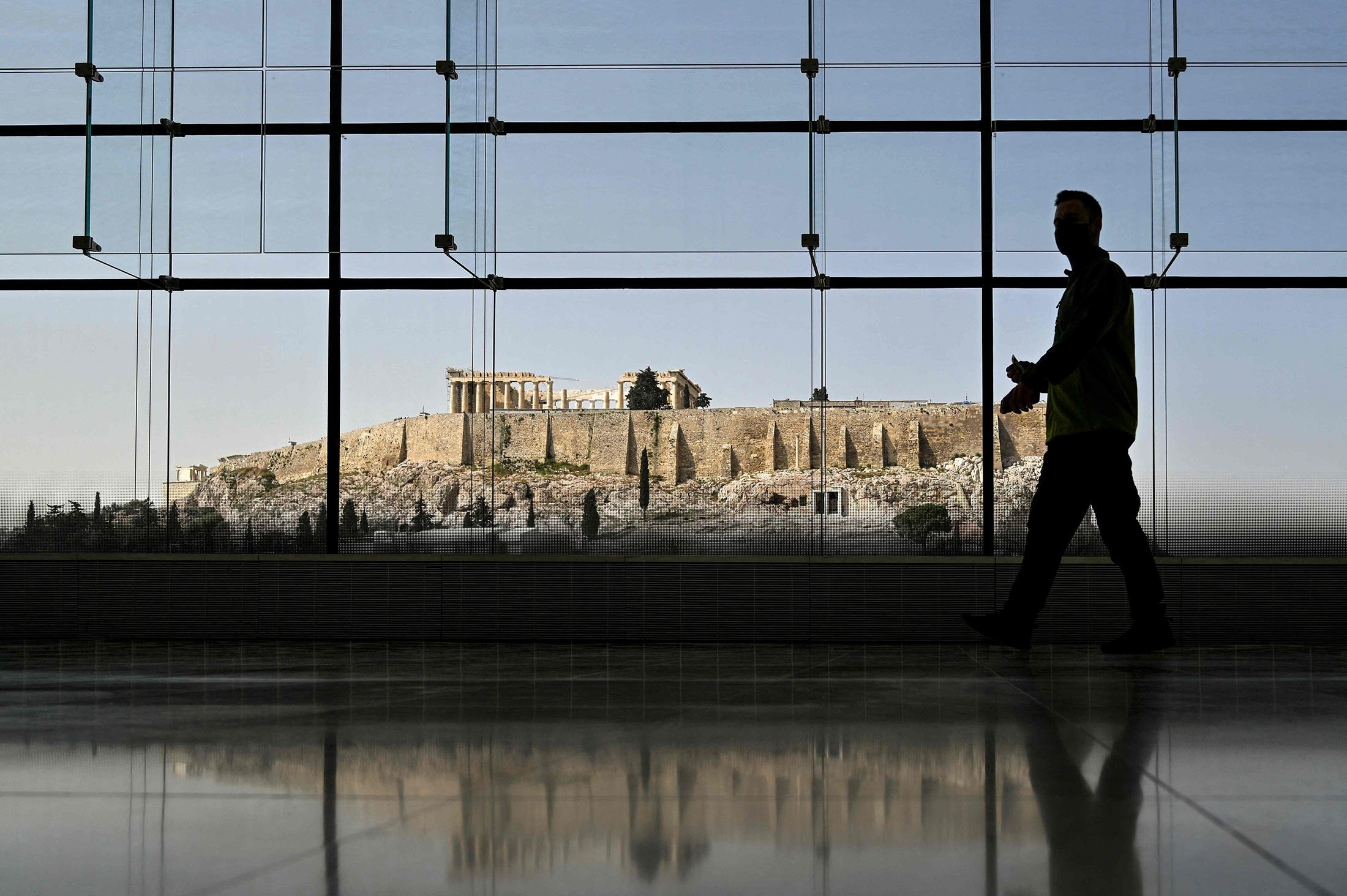A visitor walks in the "Parthenon room" of the Acropolis museum in Athens, Greece, April 6, 2022. (AFP Photo)