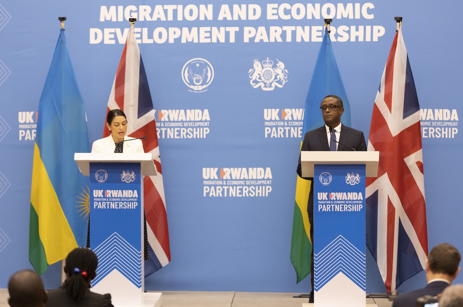 British Home Secretary Priti Patel (L) addresses a press conference with Rwandan Foreign Minister Vincent Biruta during a signing ceremony regarding a migration and economic development partnership between the U.K. and Rwanda in Kigali, Rwanda, April 14, 2022. (EPA Photo)