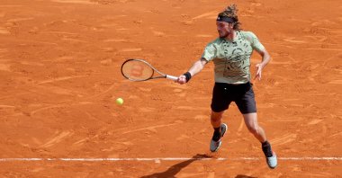 Greece's Stefanos Tsitsipas plays against Serbia's Laslo Djere at the Monte Carlo Masters in Monaco, April 14, 2022. (AFP Photo)