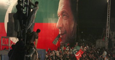Supporters of former Pakistani Prime Minister Imran Khan attend an anti-government rally, in Peshawar, Pakistan, April 13, 2022. (AP Photo)