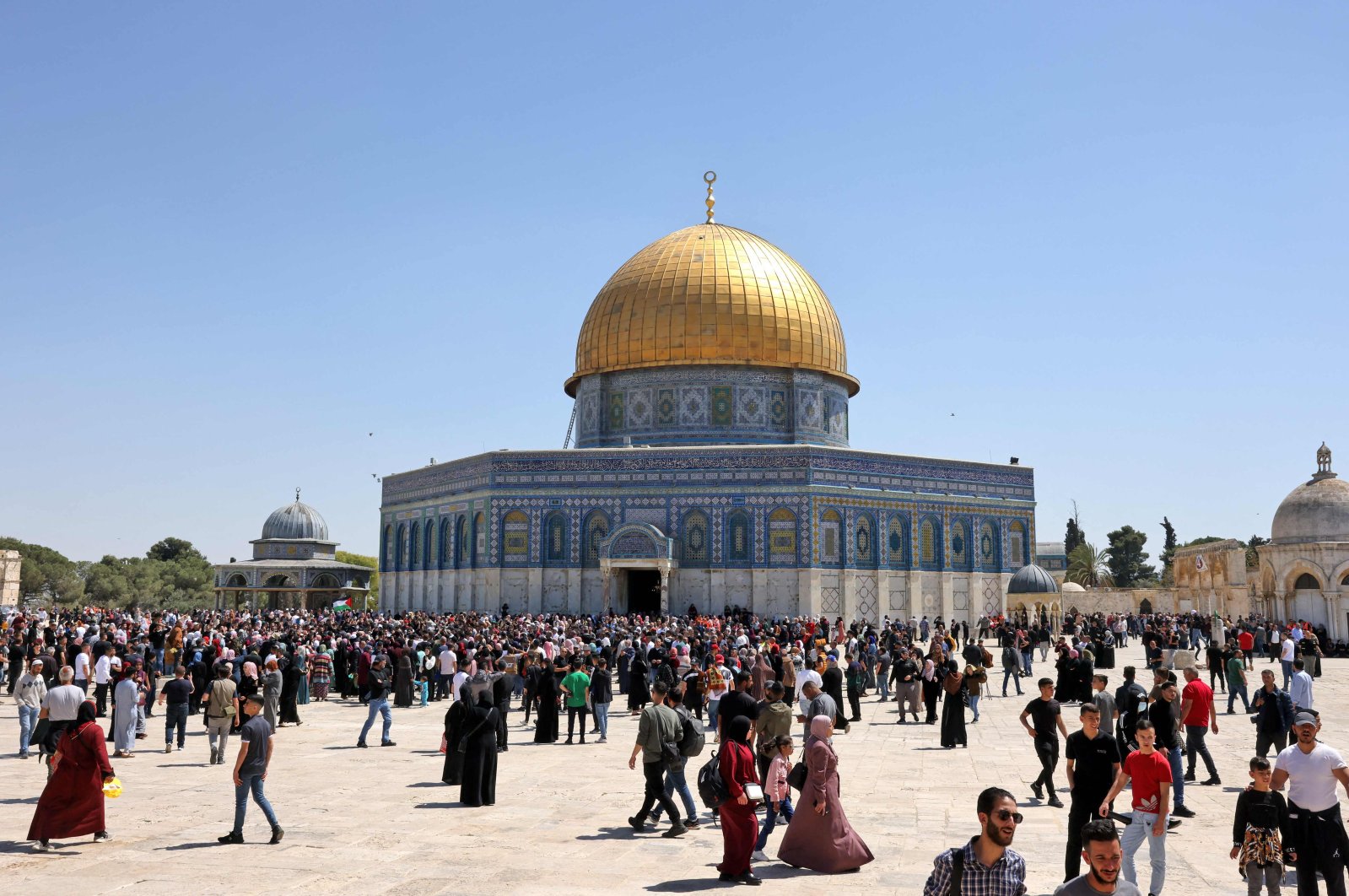 Palestinian Muslims gather at Jerusalem&#039;s Al-Aqsa mosque complex following Friday prayers during the holy month of Ramadan, April 15, 2022. (AFP)