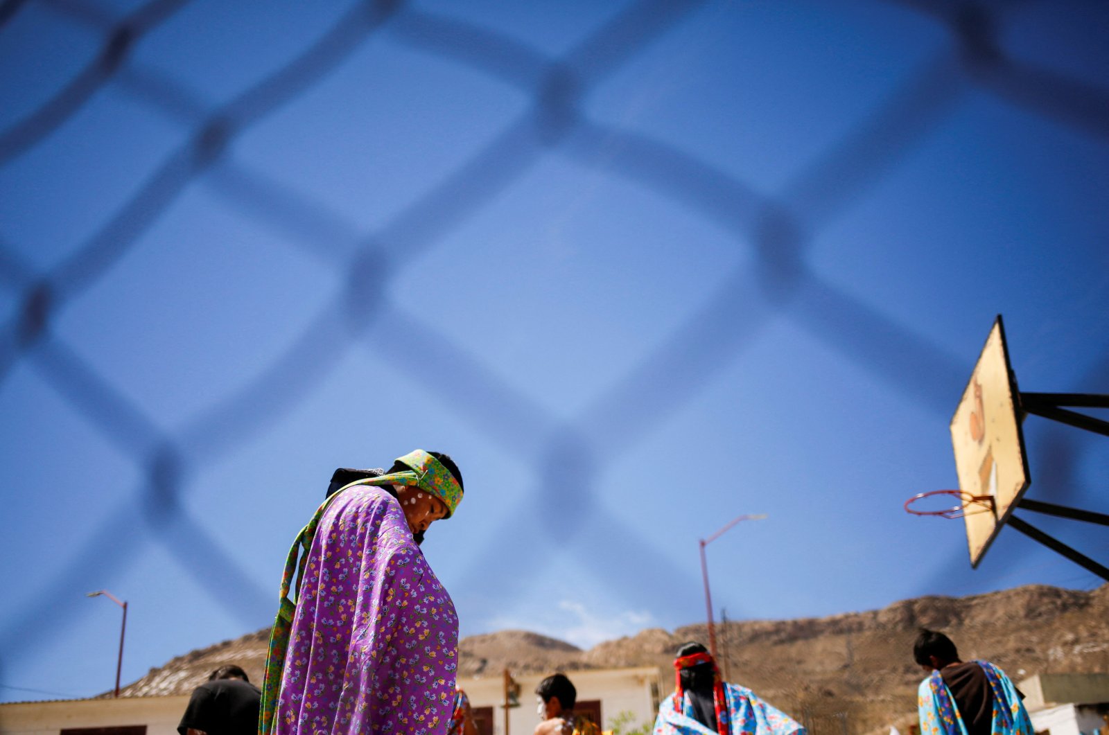 An indigenous Raramuri person participates in Good Friday celebrations in the Tarahumara neighborhood of Ciudad Juarez, Mexico, April 15, 2022. (REUTERS)