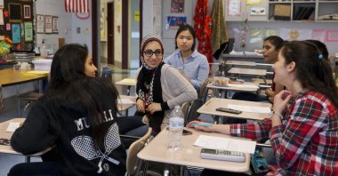 In this file photo, students chat in class before an after-hours study session for their math final at Northwest High School in Germantown, Maryland, U.S., May 10, 2016. (AP Photo)