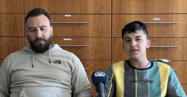 Father Ersen Altıntaş (L) and Emirhan Altıntaş speak in an interview, Sunday, April 17, 2022. (AA Photo)