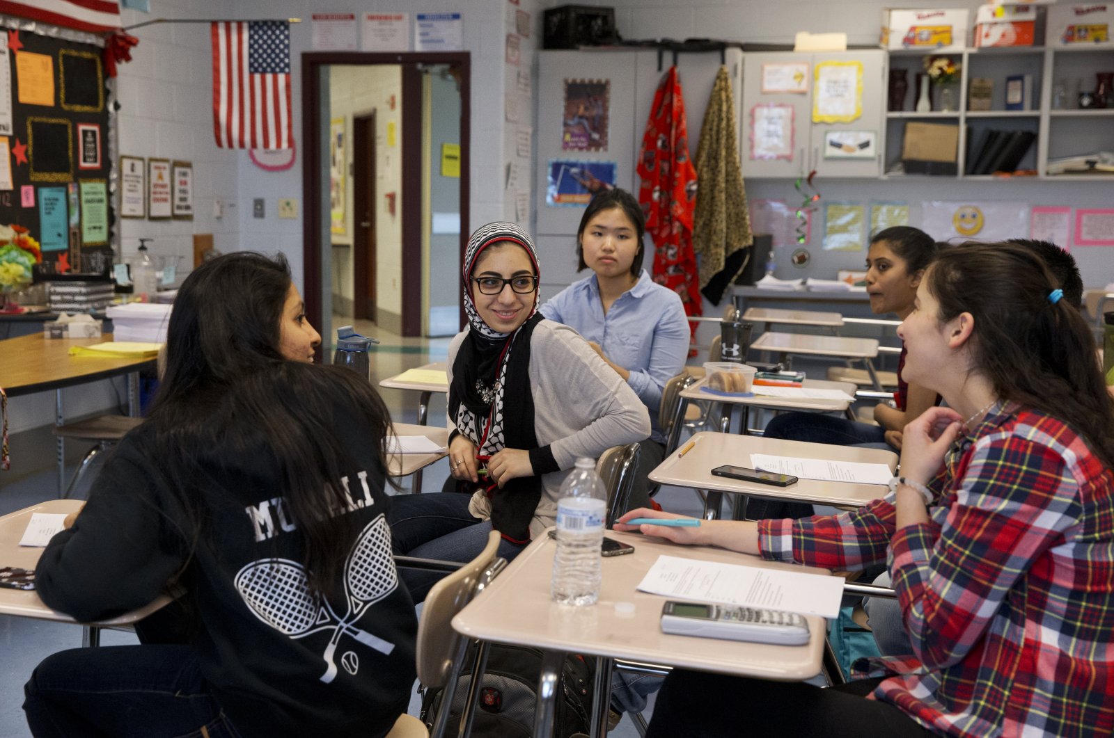 In this file photo, students chat in class before an after-hours study session for their math final at Northwest High School in Germantown, Maryland, U.S., May 10, 2016. (AP Photo)
