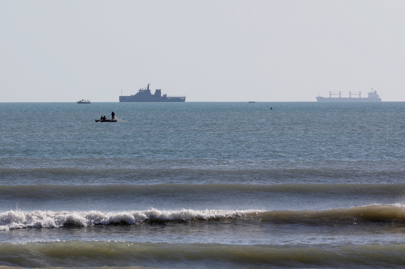 Boats are seen off the coast of Gabes where a merchant fuel ship sank, Tunisia, April 17, 2022. (Reuters Photo)