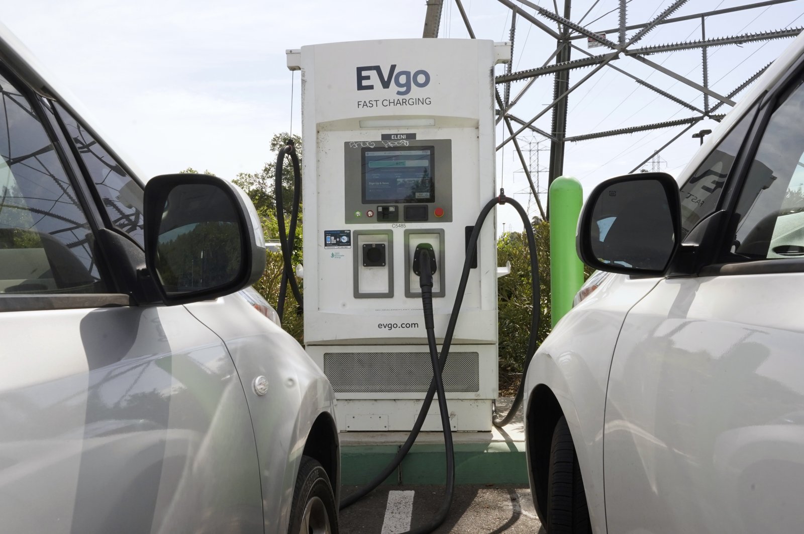 Electric cars are parked at a charging station in Sacramento, California, U.S., April 13, 2022. (AP Photo)
