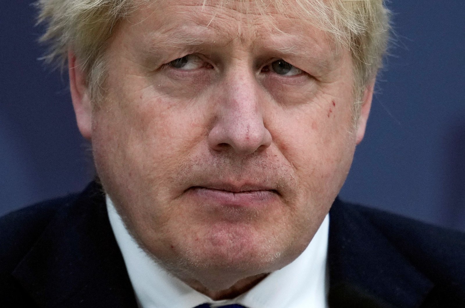 Britain&#039;s Prime Minister Boris Johnson makes a speech on immigration, at Lydd Airport, in southeast England, April 14, 2022. (AFP Photo)