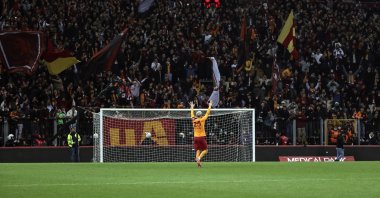 Galatasaray defender Victor Enok Nelsson, who excelled in the match with his performance, waves at fans after being applauded at the Lions' Ali Sami Yen Sports Complex Nef Stadium on April 18, 2022. (AA Photo)