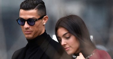 Cristiano Ronaldo (L) and Georgina Rodriguez are seen after a court hearing for tax evasion, Madrid, Spain, Jan. 22, 2019. (AFP Photo)