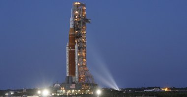 The NASA Artemis rocket with the Orion spacecraft aboard leaves the Vehicle Assembly Building moving slowly on an 11-hour journey to pad 39B at the Kennedy Space Center in Cape Canaveral, Florida, U.S., March 17, 2022. (AP Photo)