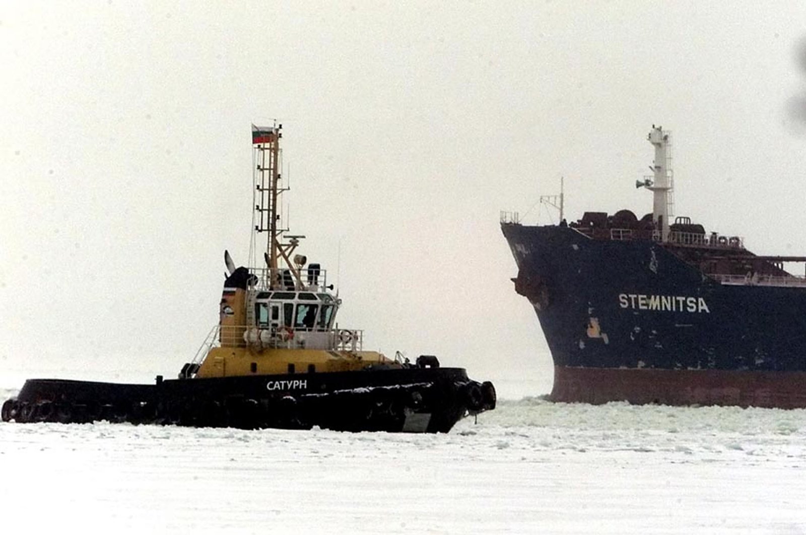 The Greek-registered ship Stemnitsa (R) with 100,000 tons of crude oil on board leaves the Russian port of Primorsk, Feb. 5, 2003. (Reuters File Photo)
