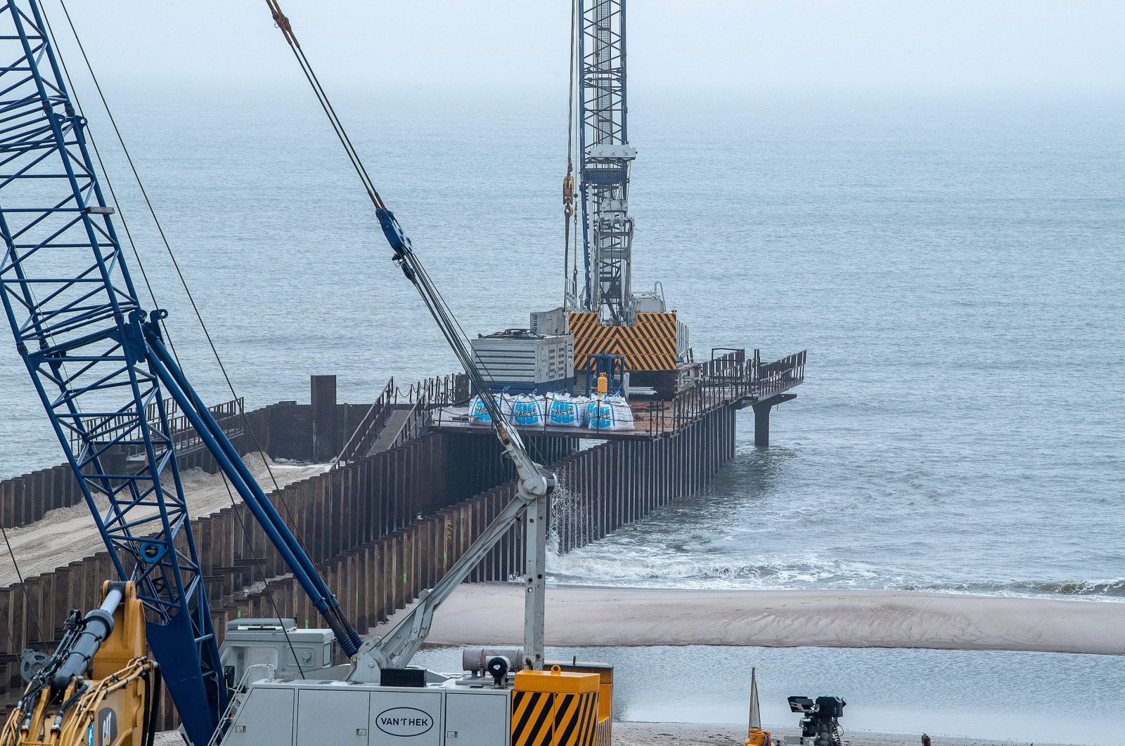 The construction site for a 200 meter long pier where the Baltic Sea gas pipeline is planned to go ashore, Houstrup Strand, near Noerre Nebel, Jutland, Denmark, Feb. 23, 2021. (AFP Photo) 
