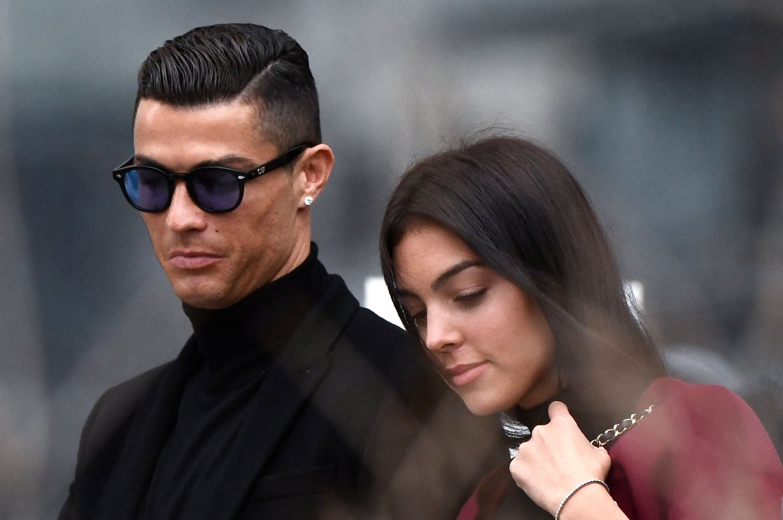 Cristiano Ronaldo (L) and Georgina Rodriguez are seen after a court hearing for tax evasion, Madrid, Spain, Jan. 22, 2019. (AFP Photo)
