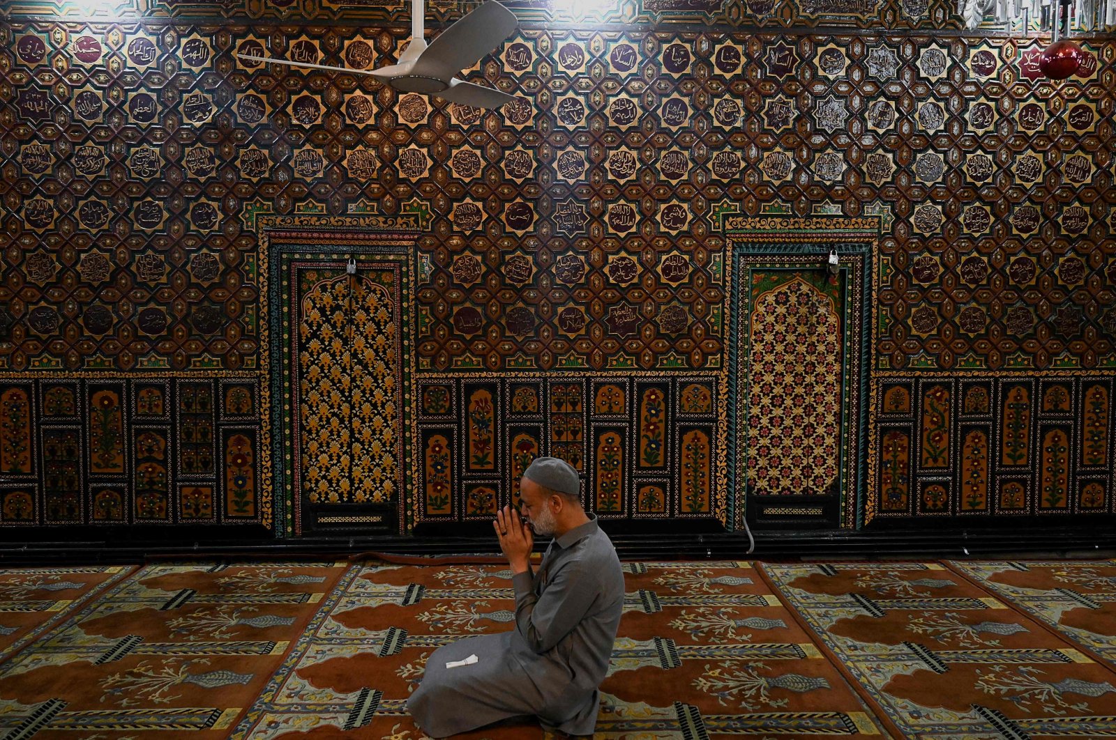 A Muslim devotee prays during the holy month of Ramadan at the Shah-i-Hamdan shrine in Srinagar, Kashmir, Apr. 13, 2022. (AFP)