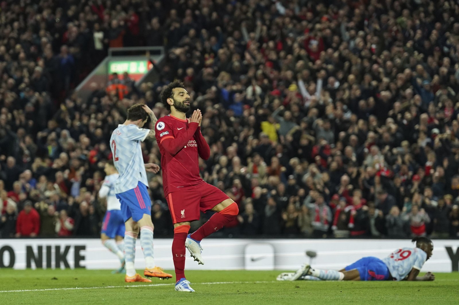 Liverpool&#039;s Mohamed Salah celebrates after scoring his side&#039;s fourth goal during the English Premier League football match between Liverpool and Manchester United at Anfield stadium in Liverpool, England, April 19, 2022. (AP Photo)