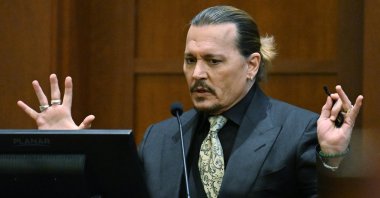 Actor Johnny Depp testifies during a hearing at the Fairfax County Circuit Court in Fairfax, Va., Tuesday April 19, 2022. (AP)