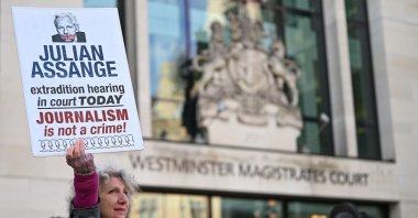 Supporters and activists hold placards outside Westminster Magistrates court calling for WikiLeaks founder Julian Assange to be freed, London, U.K., April 20, 2022. (AFP Photo)