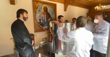 Patriarchate staff prepare the chrism in Istanbul, Turkey, April 20, 2022. (DHA PHOTO)