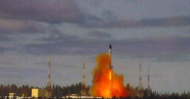 This grab from video footage released by the Russian Defense Ministry shows the launching of the Sarmat intercontinental ballistic missile at Plesetsk testing field, Russia, April 20, 2022. (Photo by Russian Defense Ministry via AFP)