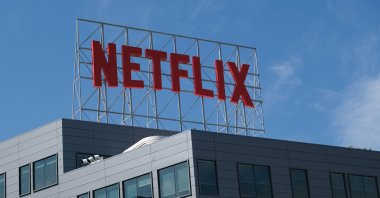 In this file photo, the Netflix logo is displayed on top of their office building in Hollywood, California, U.S., March 2, 2022. (Photo by AFP)