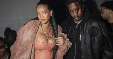 Rihanna (L) and A$AP Rocky appear at the Off-White Ready To Wear Fall/Winter 2022-2023 fashion collection, in Paris on Feb. 28, 2022. (AP File Photo)