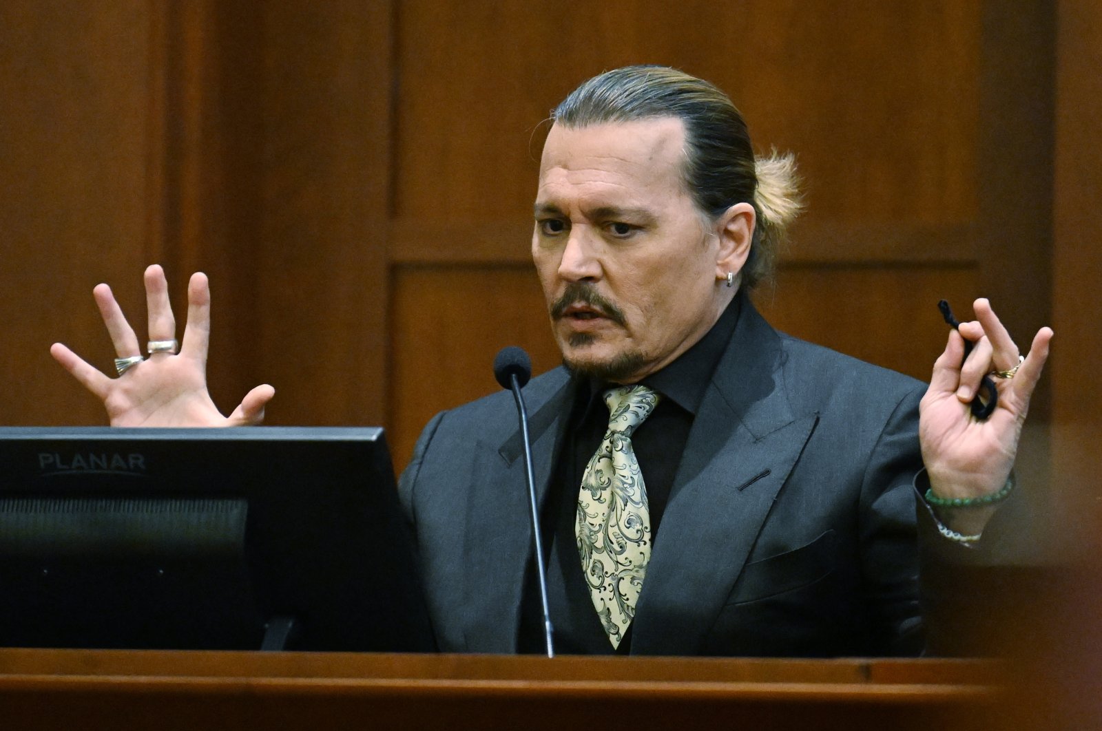Actor Johnny Depp testifies during a hearing at the Fairfax County Circuit Court in Fairfax, Va., Tuesday April 19, 2022. (AP)