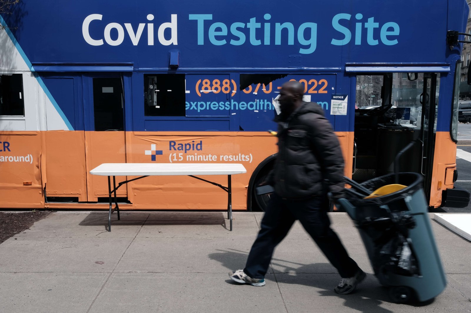 A COVID-19 testing site stands on a Brooklyn street corner, New York, U.S, April 18, 2022. (AP Photo)