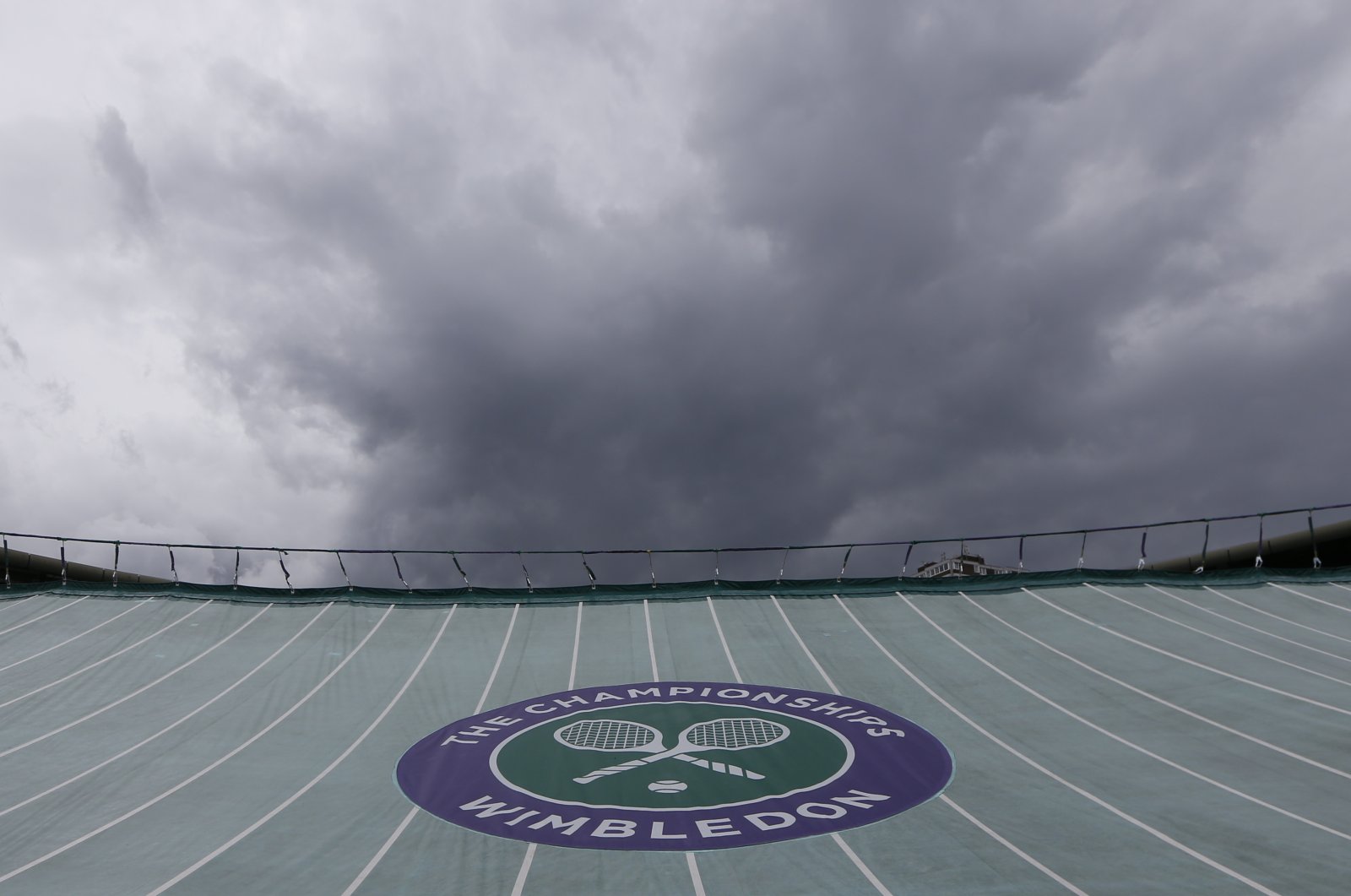 The Wimbledon logo is seen at the All England Lawn Tennis Championships, Wimbledon, London, June 28, 2014. (AP Photo)