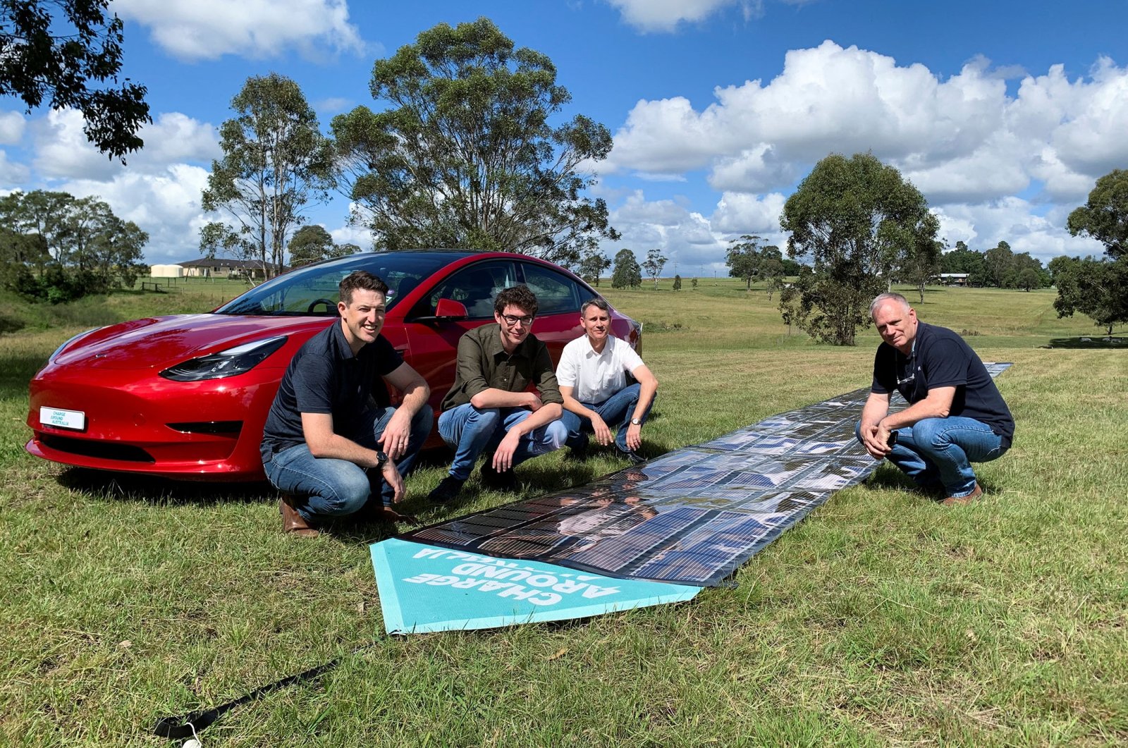 Project manager Ben Vaughan, Matthew Bergin, project lead and inventor Paul Dastoor, and chief designer Michael Dickinson, in Gosforth, NSW, Australia, April 10, 2022. (Reuters Photo)