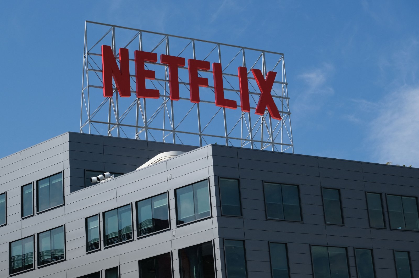 In this file photo, the Netflix logo is displayed on top of their office building in Hollywood, California, U.S., March 2, 2022. (Photo by AFP)