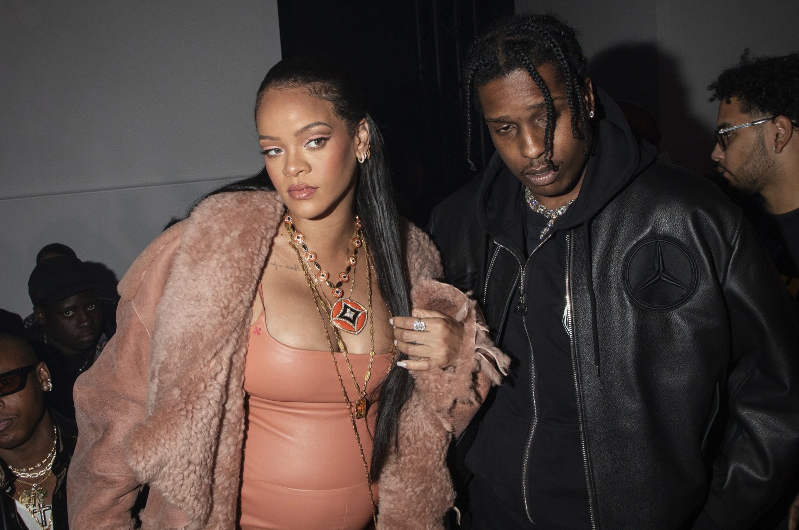 Rihanna (L) and A$AP Rocky appear at the Off-White Ready To Wear Fall/Winter 2022-2023 fashion collection, in Paris on Feb. 28, 2022. (AP File Photo)