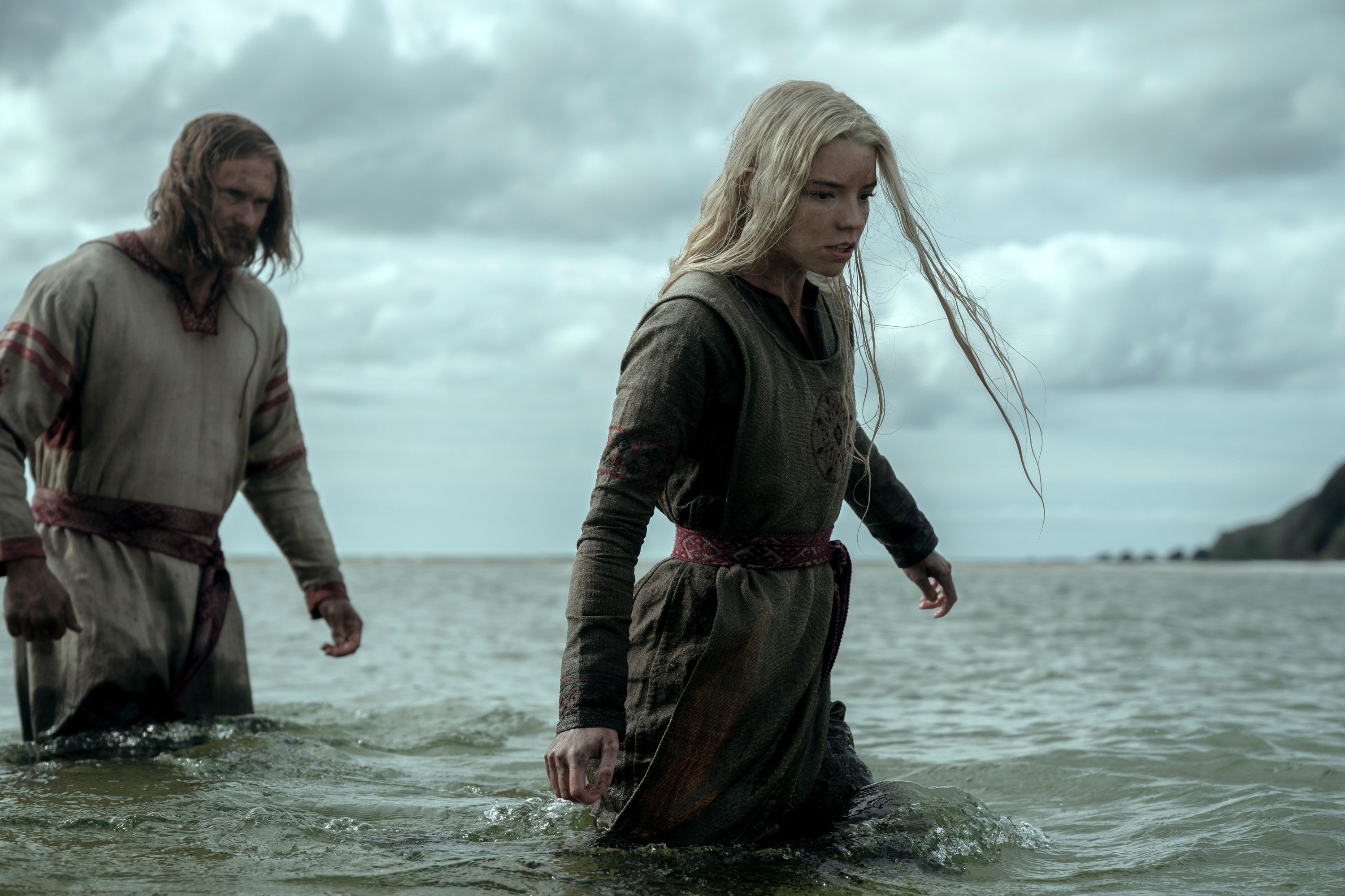 This image released by Focus Features shows Alexander Skarsgard (L), and Anya Taylor-Joy in a scene from 'The Northman,' April 18, 2022. (AP Photo)