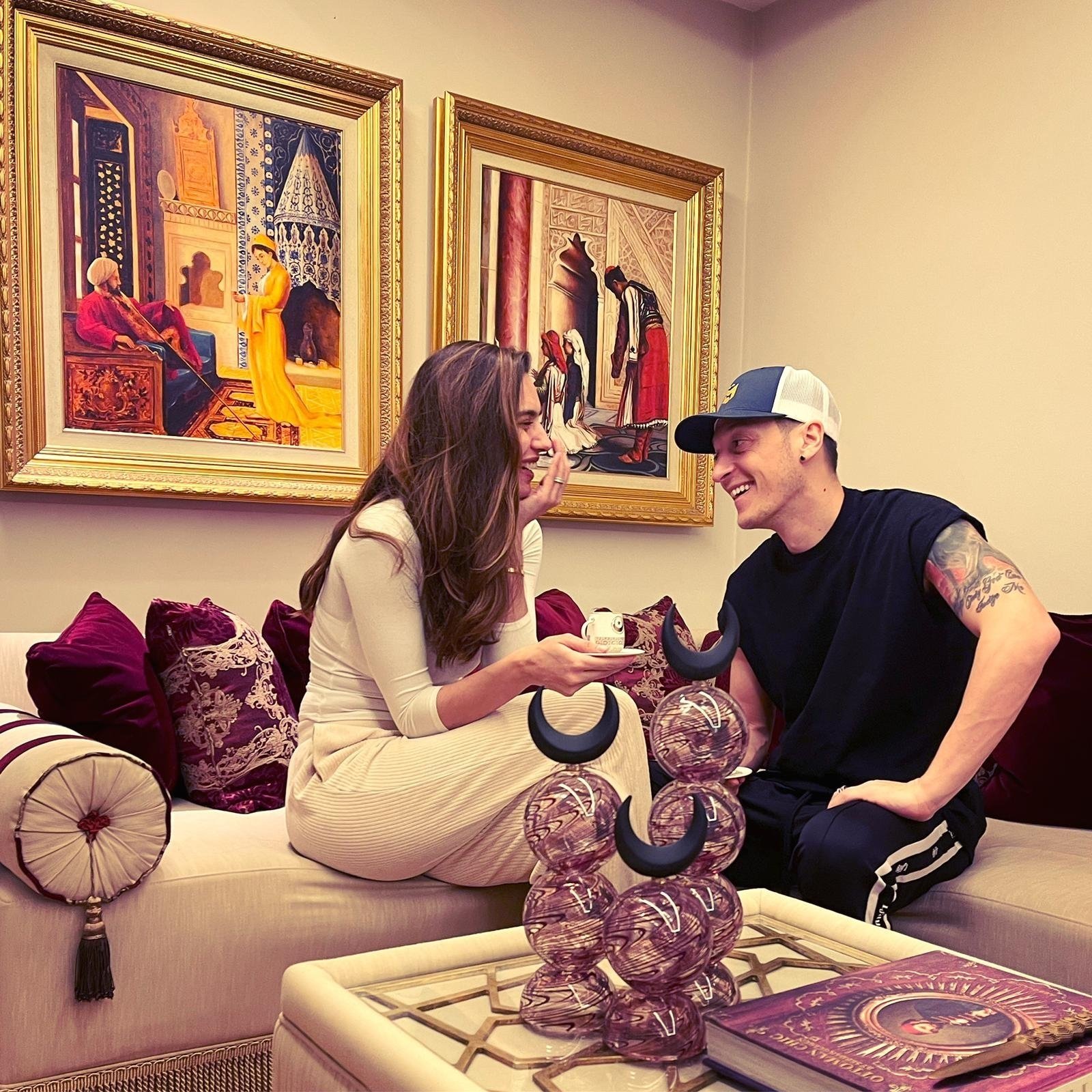 German-Turkish footballer Mesut Özil (R) with his wife in their London home, England, Jan. 10, 2021. (Mesut Özil on Twitter)