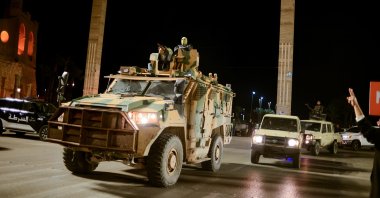 Members of the military arrive to take part in a parade calling for parliamentary and presidential elections, at Martyr&#039;s Square in Tripoli, Libya, Feb. 12, 2022. (Reuters File Photo)