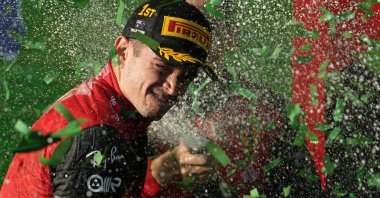 Ferrari's Charles Leclerc celebrates on the podium after winning the F1 Australian GP, Melbourne, Australia, April 10, 2022. (EPA Photo)
