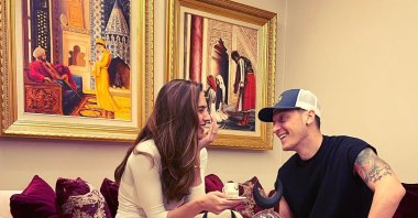 German-Turkish footballer Mesut Özil (R) with his wife in their London home, England, Jan. 10, 2021. (Mesut Özil on Twitter)