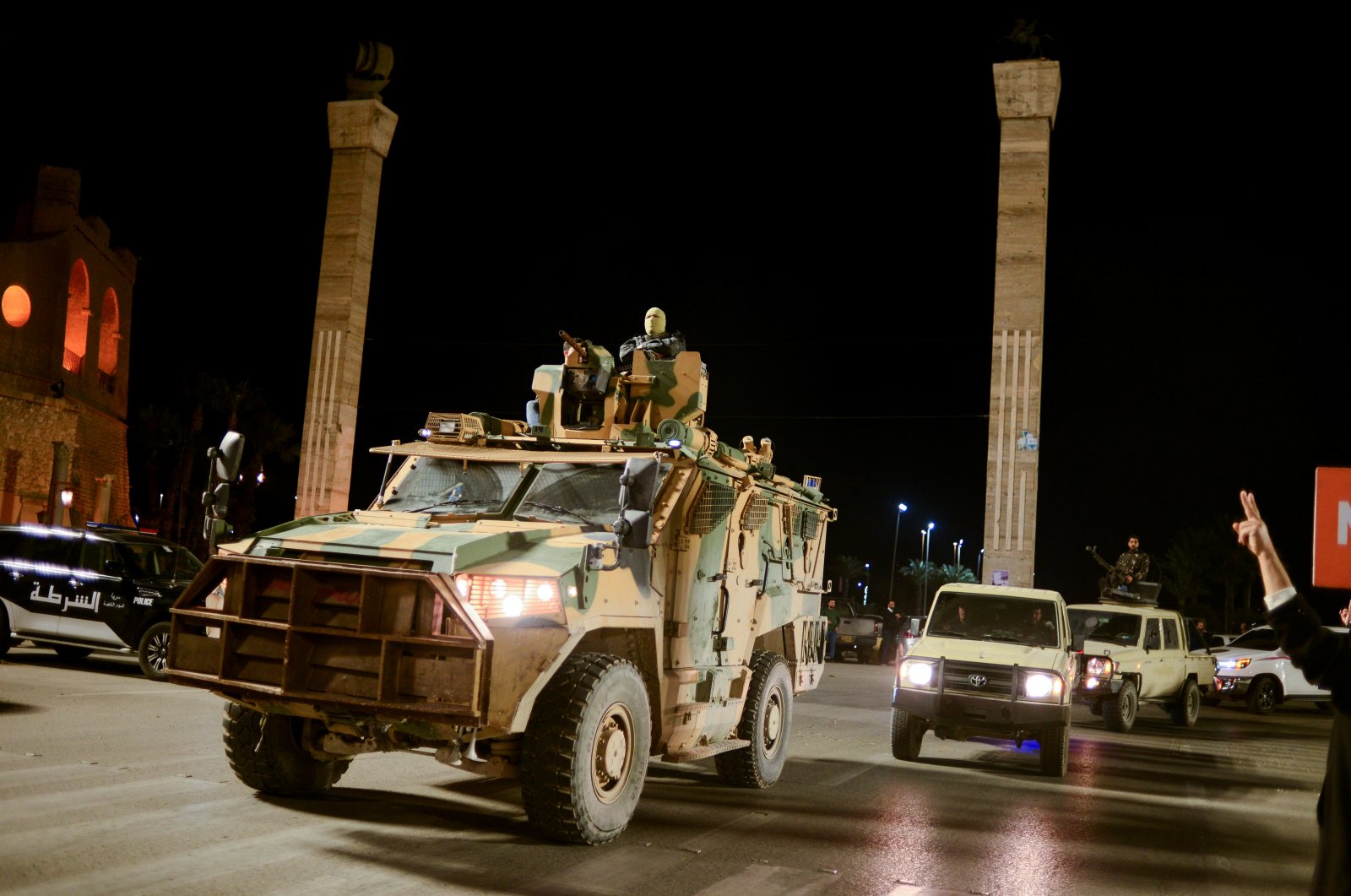 Members of the military arrive to take part in a parade calling for parliamentary and presidential elections, at Martyr&#039;s Square in Tripoli, Libya, Feb. 12, 2022. (Reuters File Photo)