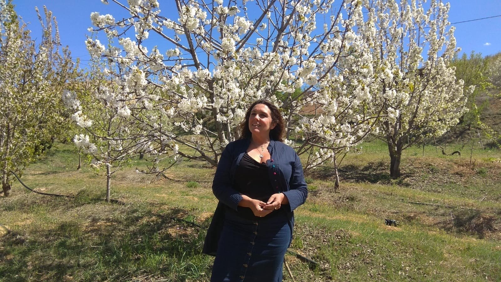 British historian, writer and broadcaster Bettany Mary Hughes in a cherry orchard, Malatya, eastern Turkey, April 21, 2022. (AA Photo)