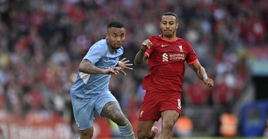 Manchester City's Gabriel Jesus in action with Liverpool's Naby Keita during an FA Cup semifinal match at the Wembley Stadium, in London, Britain, April 16, 2022. (Reuters Photo)
