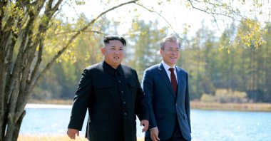 South Korean President Moon Jae-in (R) and North Korean leader Kim Jong Un walk during a luncheon, in this photo released by North Korea's Korean Central News Agency (KCNA) on Sept. 21, 2018. (KCNA via Reuters)