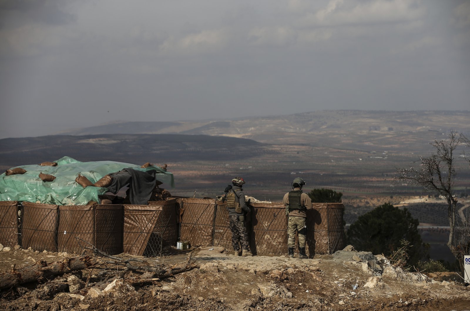 Turkish soldiers hold a position atop the Bursayah hill in the greater Afrin district, Syria, Saturday, March 3, 2018. (AP File Photo)