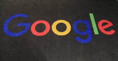 The logo of Google is displayed on a carpet at the entrance hall of Google France in Paris, Nov. 18, 2019. (AP Photo)