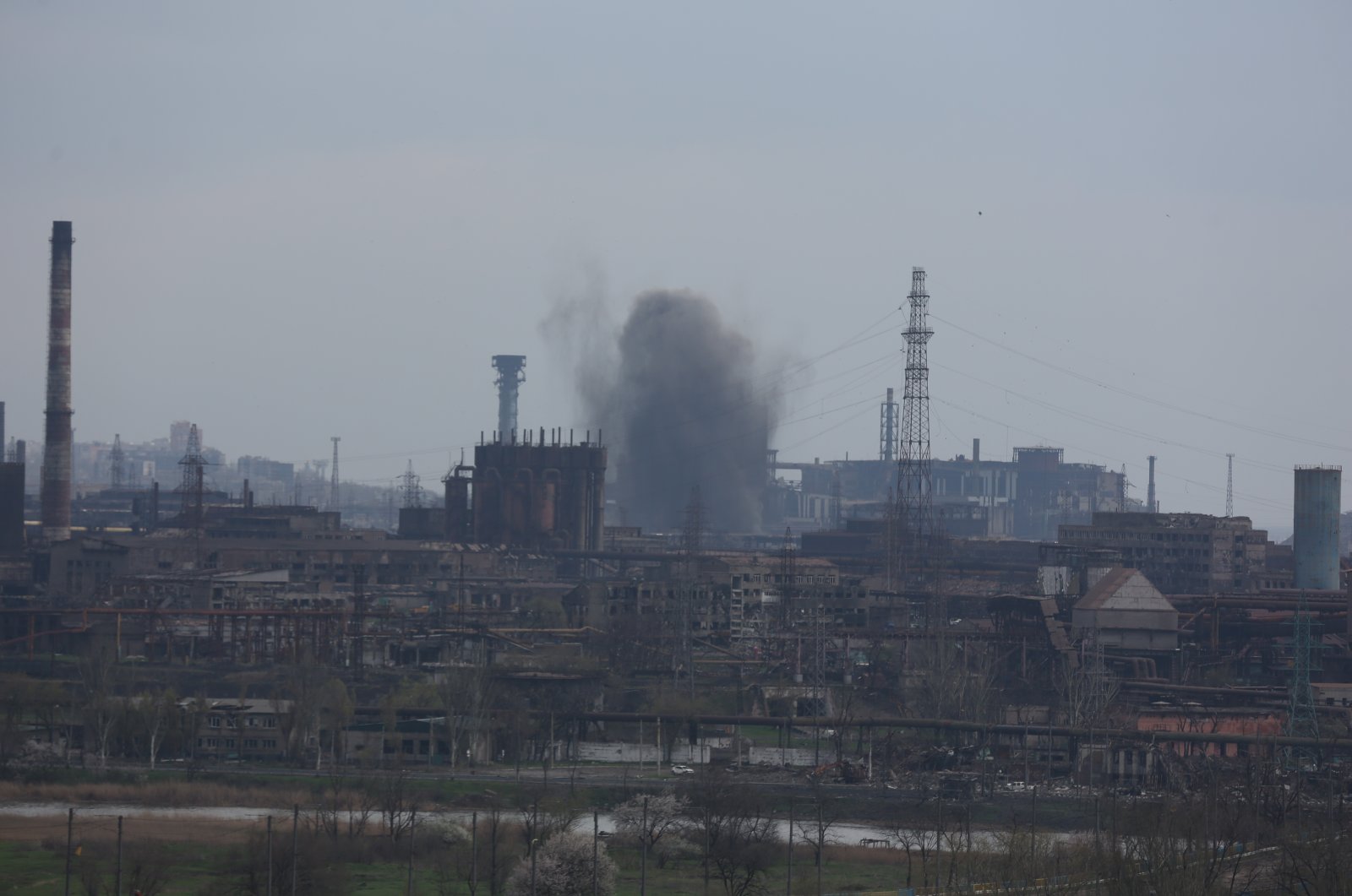 Smoke rises from the Azovstal plant as the Russian army has taken control of Ukraine&#039;s besieged port city of Mariupol except for the Azovstal plant, April 22, 2022. (AA Photo)