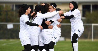 Melbourne Victory Afghan women&#039;s team players celebrate a goal, which was disallowed, during their first match in a local league, Melbourne, Australia, April 24, 2022. (AFP Photo)
