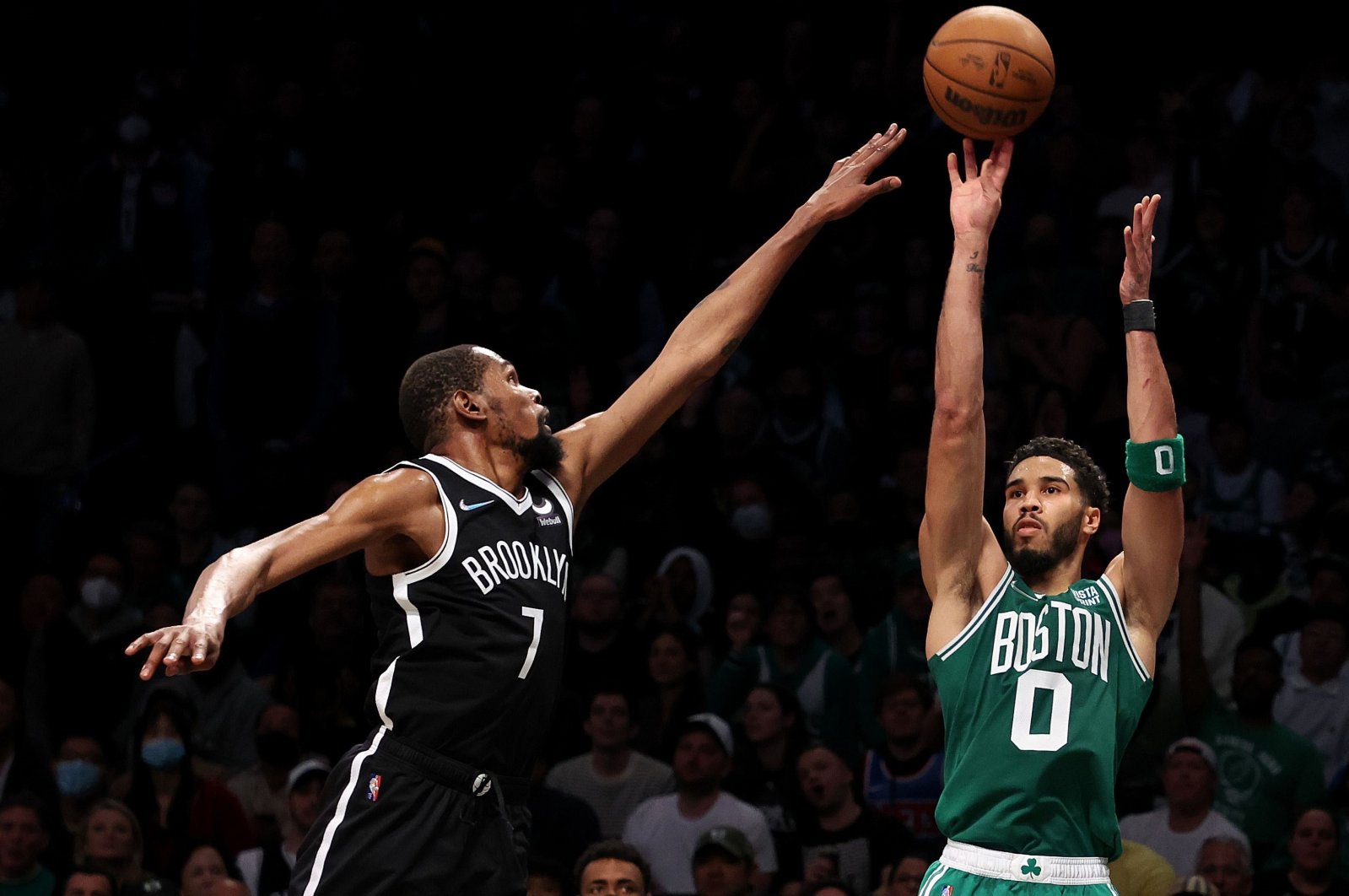 Celtics&#039; Jayson Tatum (R) shoots a 3-pointer against Nets&#039; Kevin Durant in an NBA playoffs game, New York City, U.S., April 23, 2022. (AFP Photo)